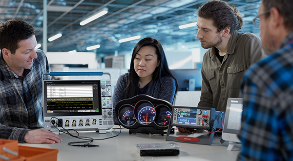 An engineering team uses an oscilloscope to see CAN activity on an instrument cluster